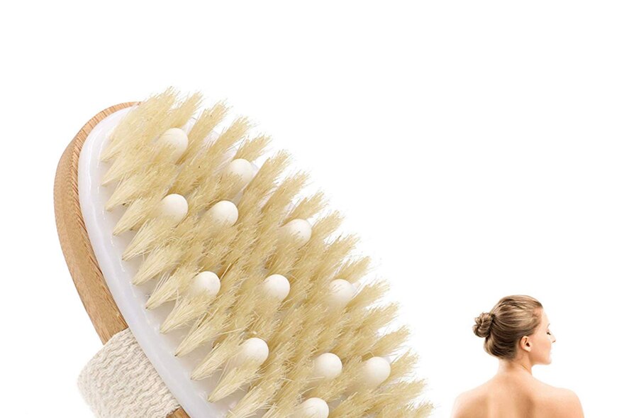 Brosse pour le corps à peau sèche, une brosse de bain exfoliante.